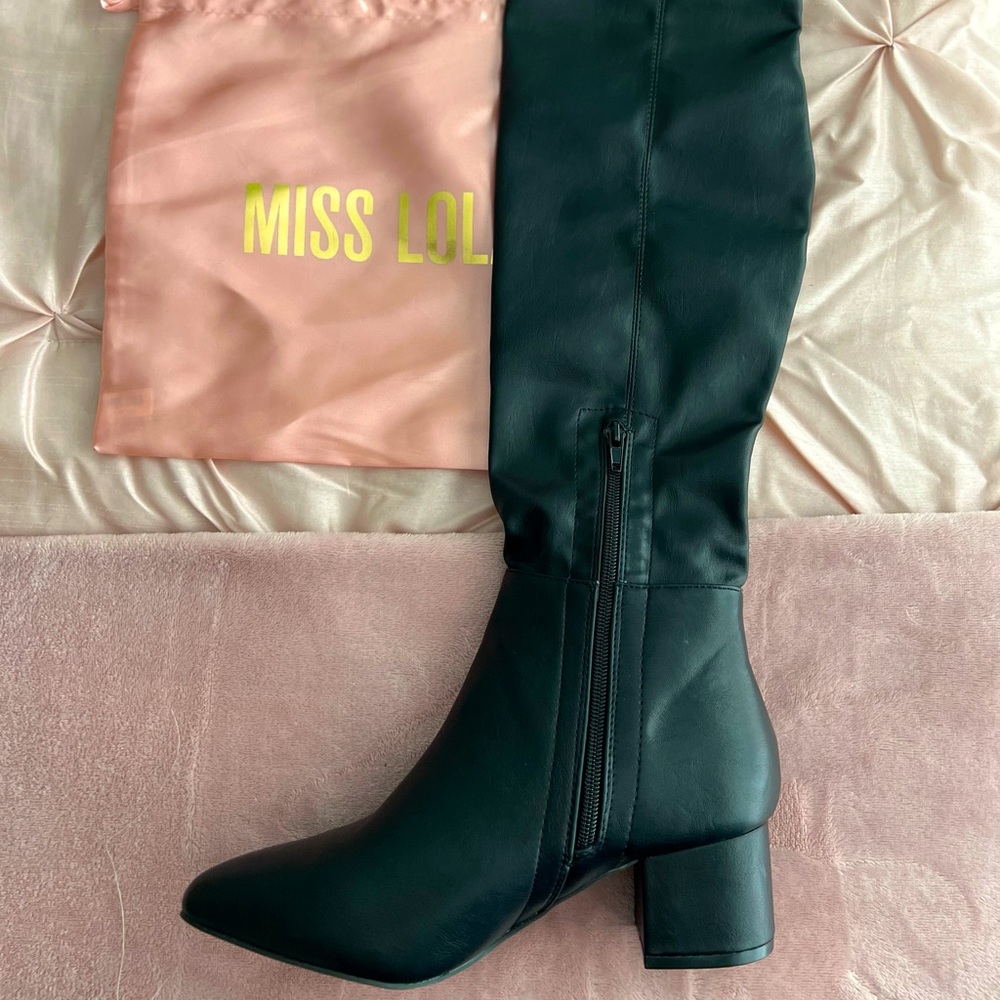 Black leather high knee boots